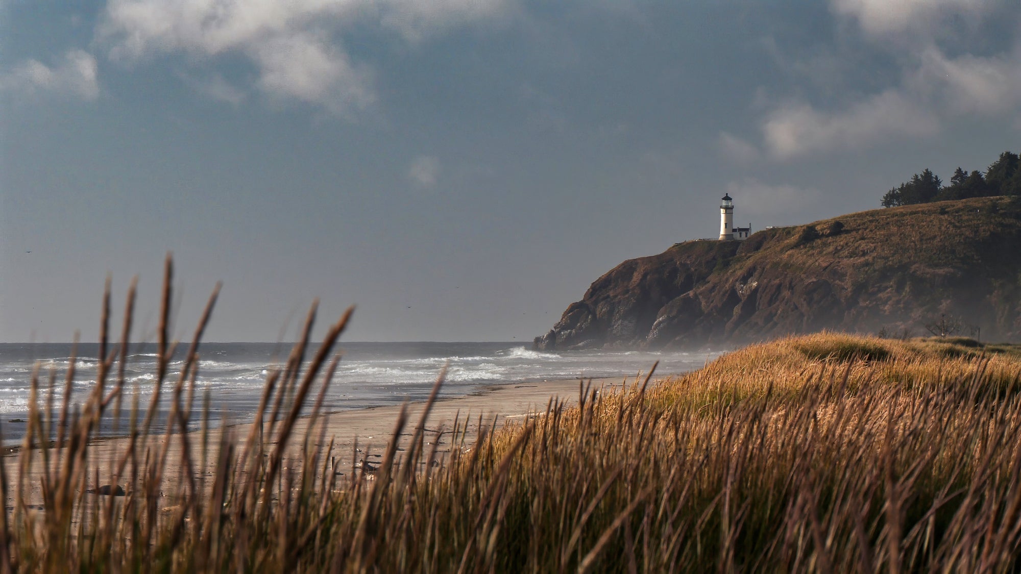 Cape Disappointment lighthouse on the Washington coast at dusk